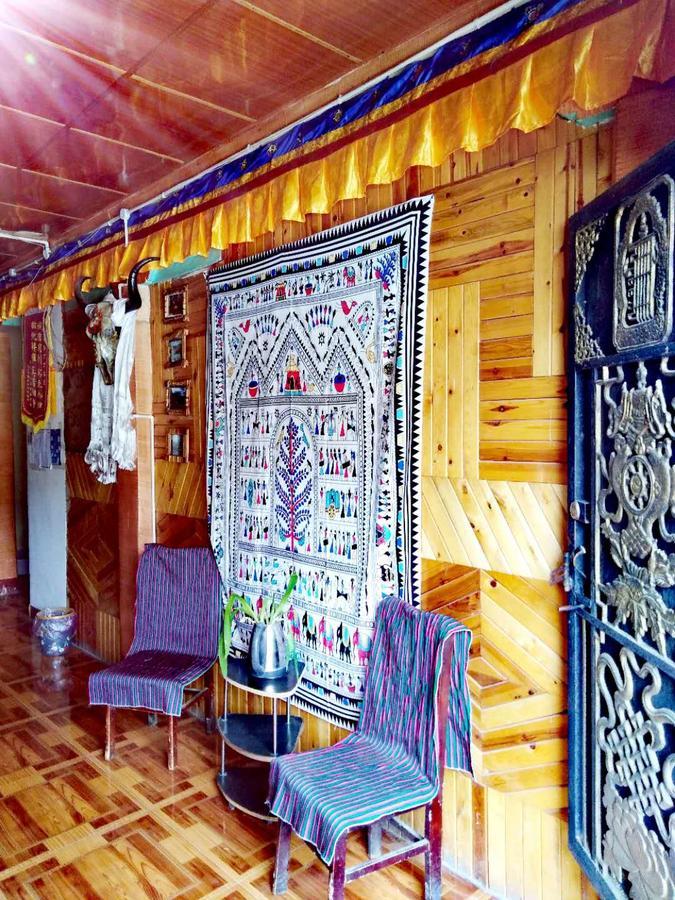 Zishuo Zihua Guest House Daocheng Exterior photo