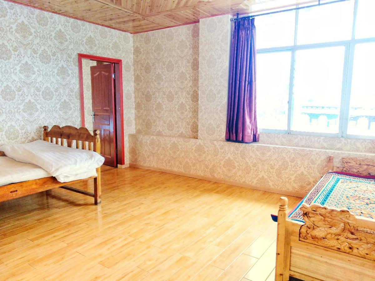 Zishuo Zihua Guest House Daocheng Exterior photo