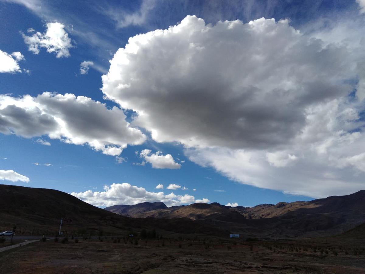 Zishuo Zihua Guest House Daocheng Exterior photo
