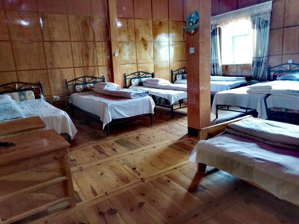 Zishuo Zihua Guest House Daocheng Exterior photo