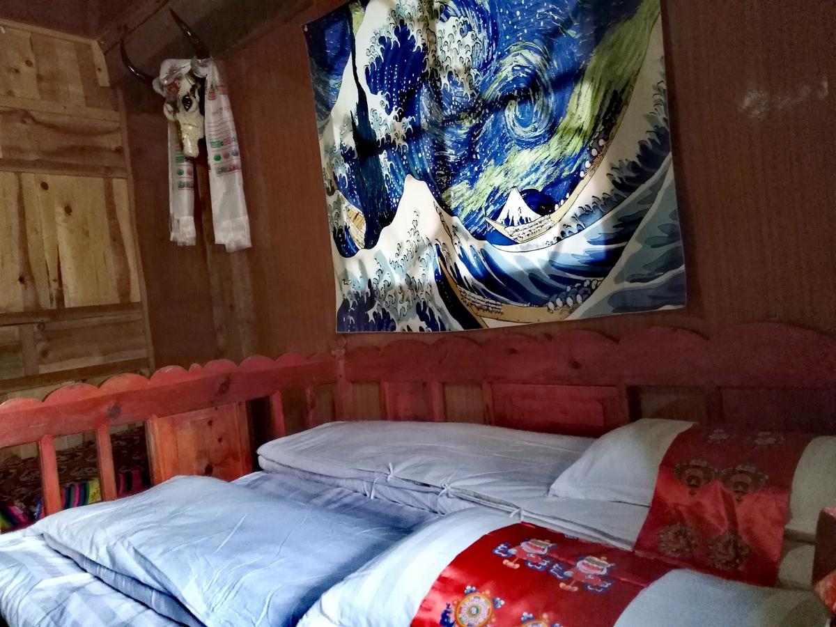 Zishuo Zihua Guest House Daocheng Exterior photo