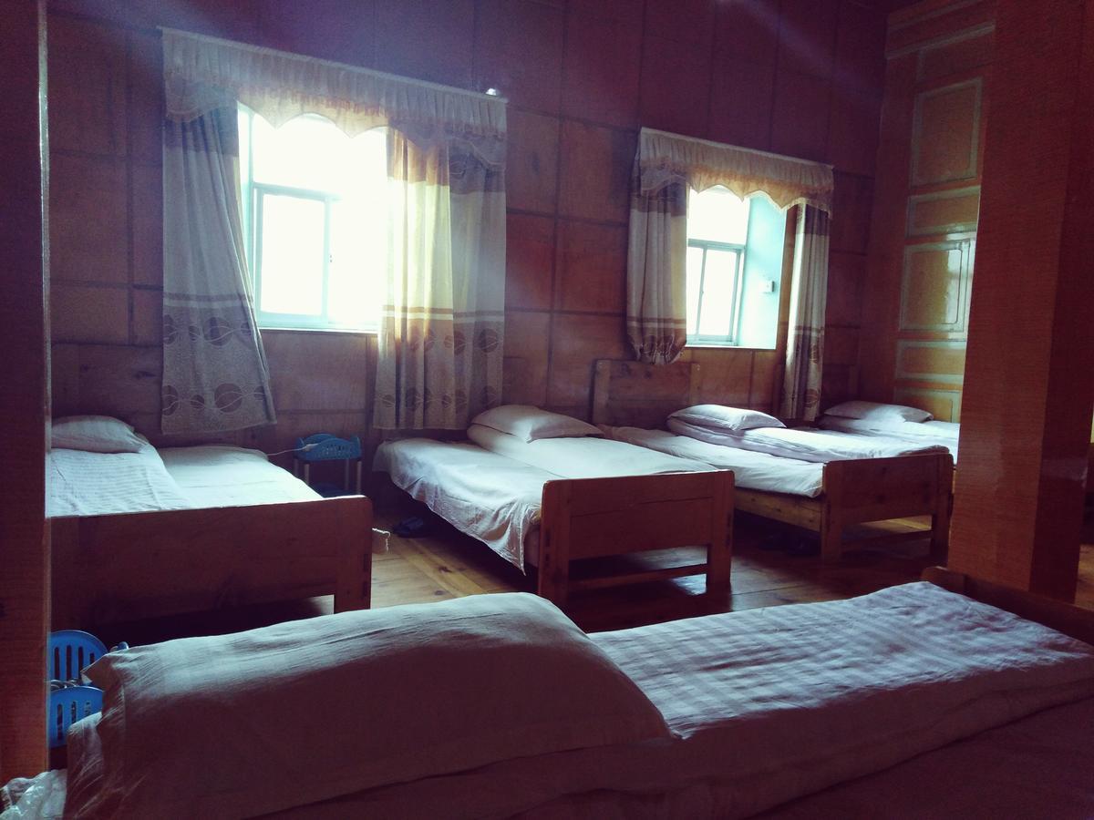 Zishuo Zihua Guest House Daocheng Exterior photo