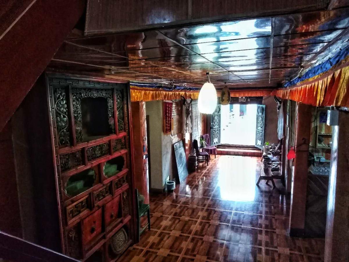 Zishuo Zihua Guest House Daocheng Exterior photo