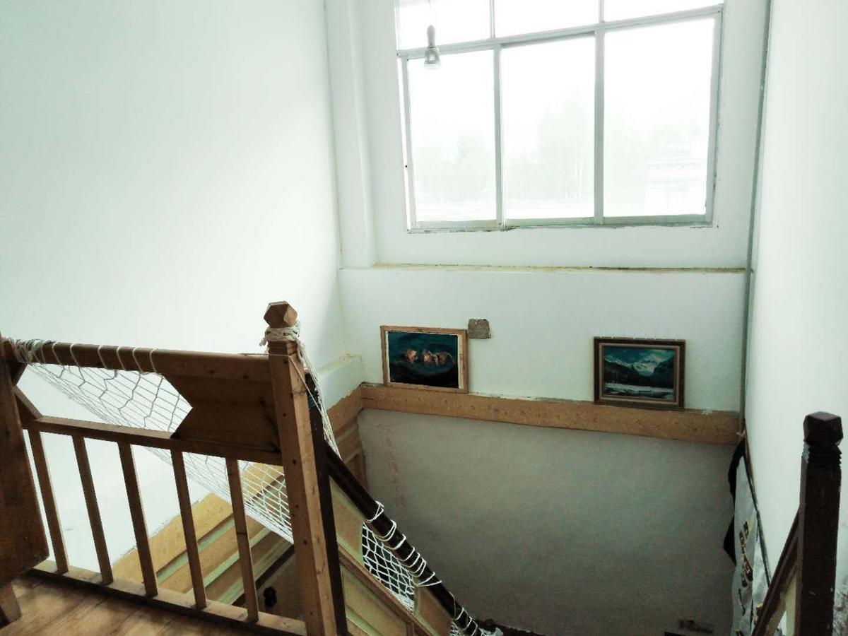 Zishuo Zihua Guest House Daocheng Exterior photo