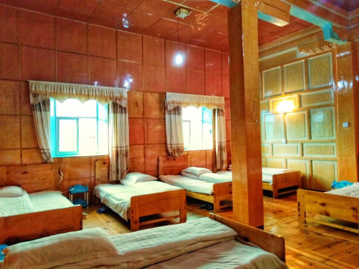 Zishuo Zihua Guest House Daocheng Exterior photo