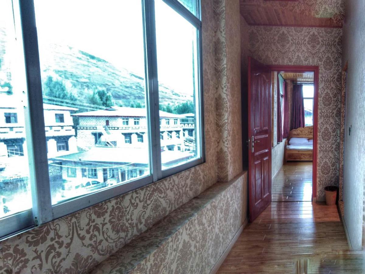 Zishuo Zihua Guest House Daocheng Exterior photo
