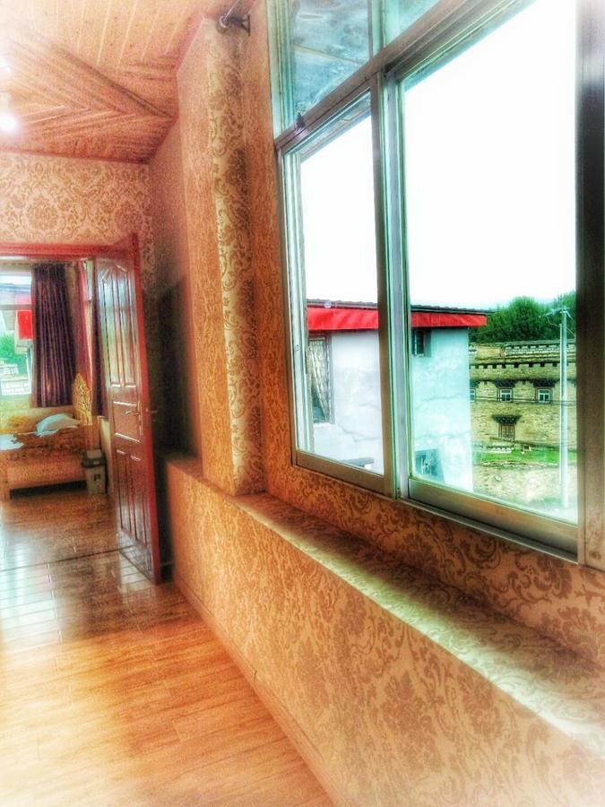 Zishuo Zihua Guest House Daocheng Exterior photo