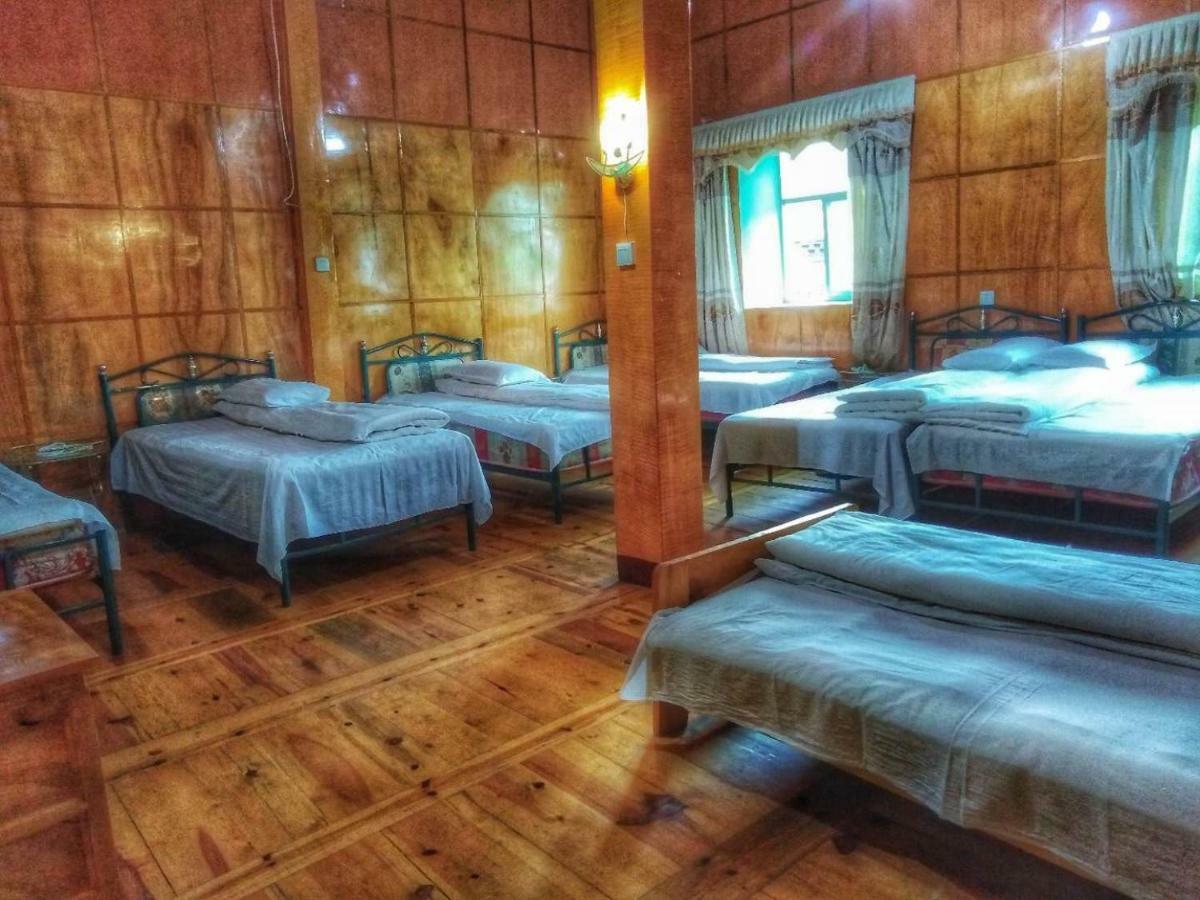 Zishuo Zihua Guest House Daocheng Exterior photo